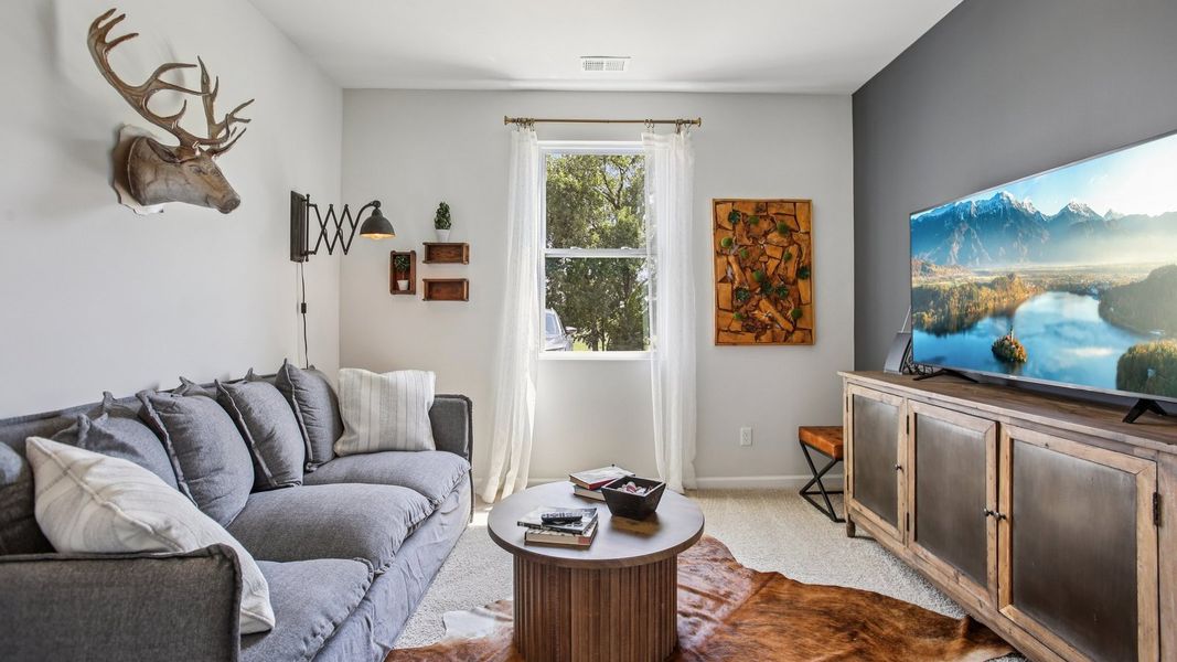 Furnished interior view inside a new home in The Parks, White House (Image 28).