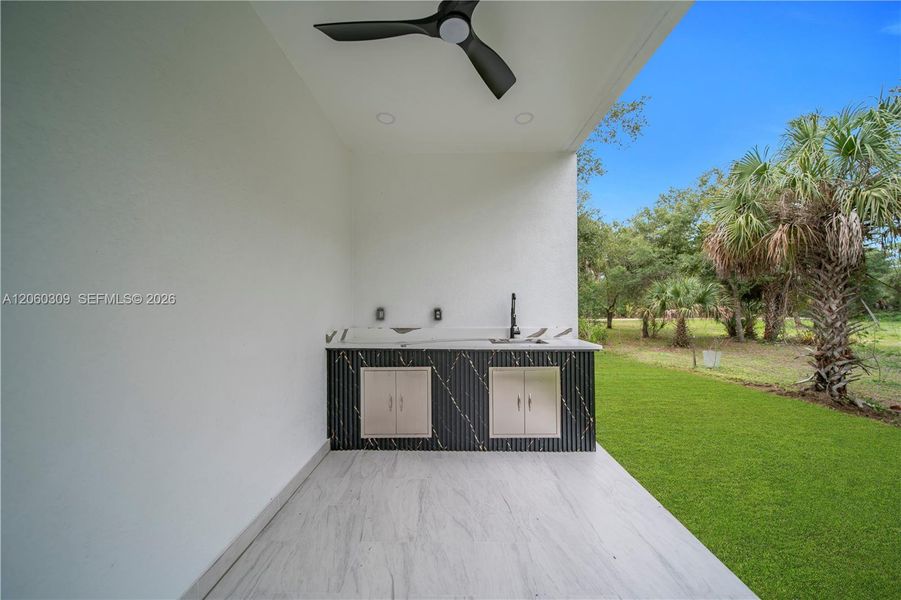 Exterior details and patio area of a home in , Lehigh Acres (Image 32).