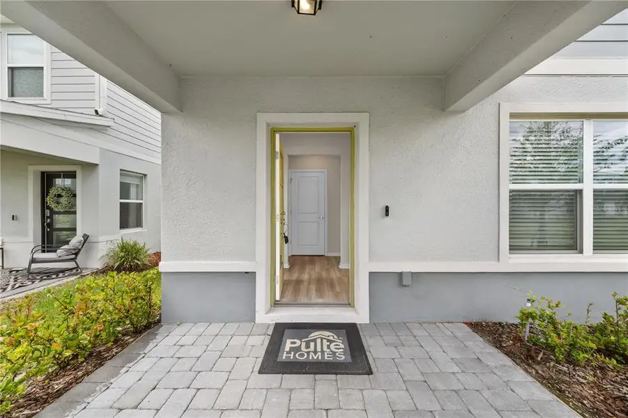Exterior details and patio area of a home in EverBe, Orlando (Image 24).
