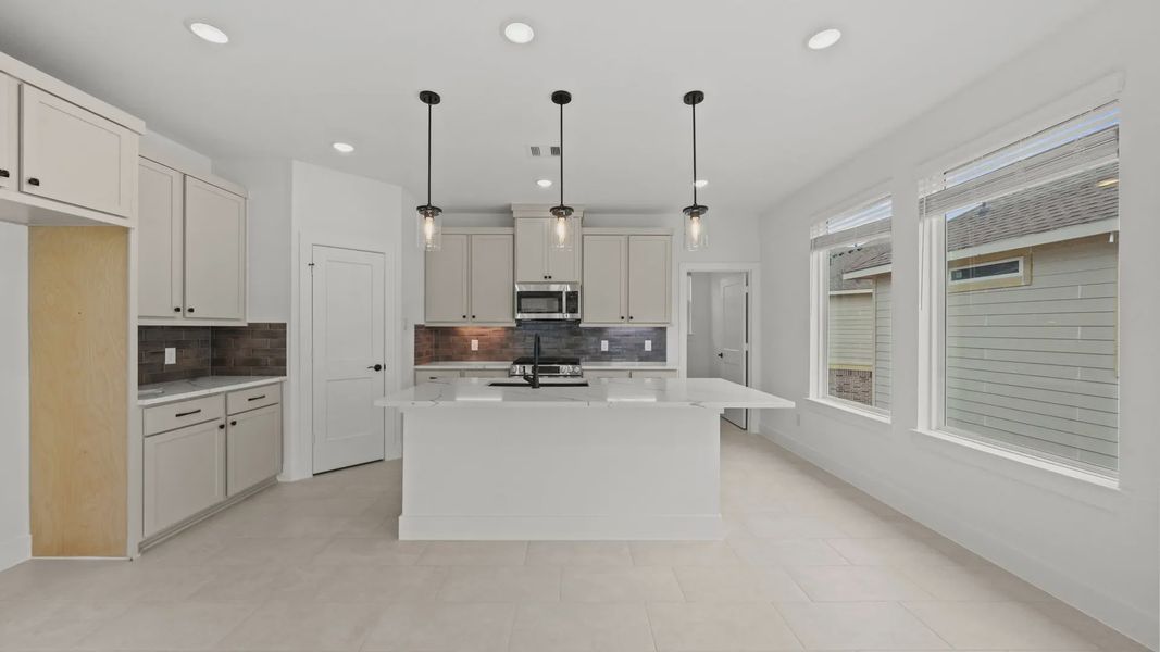 Furnished interior view inside a new home in Elyson Courtyard Collection, Katy (Image 6).