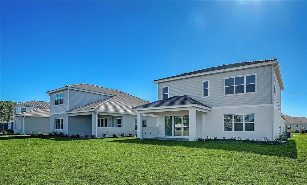 Exterior details and patio area of a home in Windward, Sarasota (Image 4). Exterior details and patio area of a home in Windward, Sarasota (Image 4).