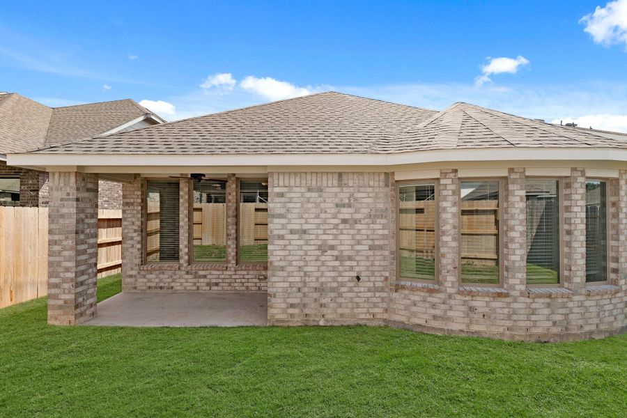 Exterior details and patio area of a home in The Trails, New Caney (Image 3). Exterior details and patio area of a home in The Trails, New Caney (Image 3).