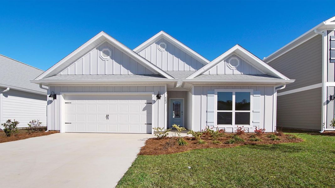 Front exterior of a new home in Caballeros Estates At Hombre, Panama City Beach, FL, highlighting curb appeal (Image 1). Front exterior of a new home in Caballeros Estates At Hombre, Panama City Beach, FL, highlighting curb appeal (Image 1).