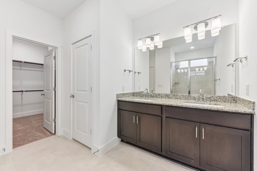 Furnished interior view inside a new home in Freedom at Anthem, Kyle (Image 9).