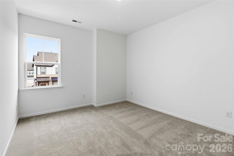Spacious, unfurnished interior of a new home in Ridge at Sugar Creek, Indian Land (Image 23).