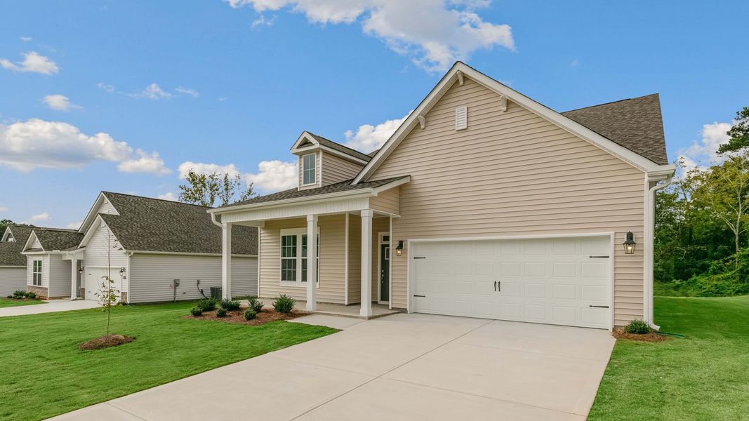 Front exterior of a new home in The Villas at Martin Farms, Aberdeen, NC, highlighting curb appeal (Image 18).