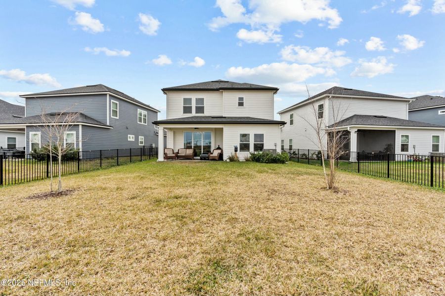 Front exterior of a new home in Silver Landing at SilverLeaf, St. Augustine, FL, highlighting curb appeal (Image 20).