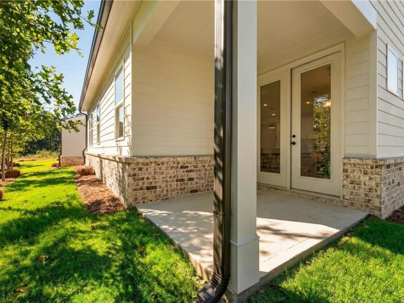 Exterior details and patio area of a home in Kelly Preserve, Loganville (Image 28).