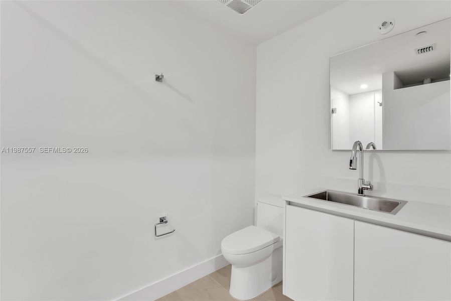 Furnished interior view inside a new home in Aria Reserve, Miami (Image 9).