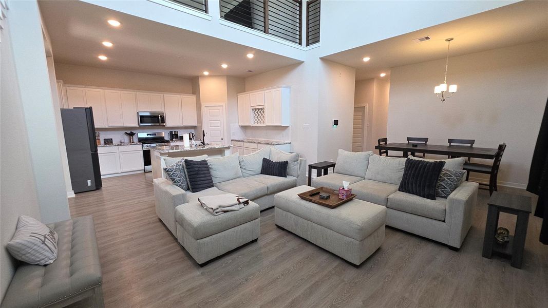 Furnished interior view inside a new home in , Conroe (Image 3).