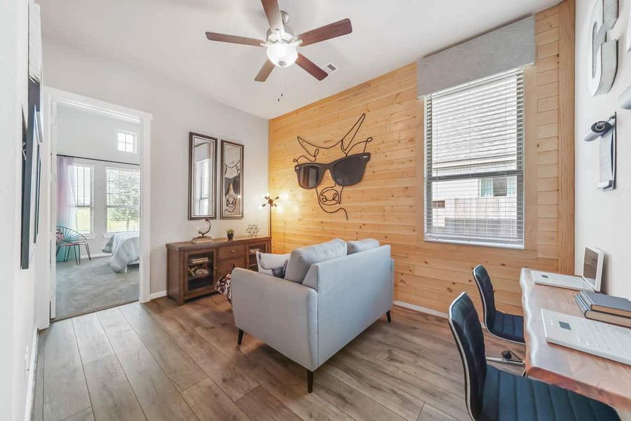 Representative furnished interior of a home built from the Oakley by Chesmar Homes in The Trails, New Caney (Image 9).