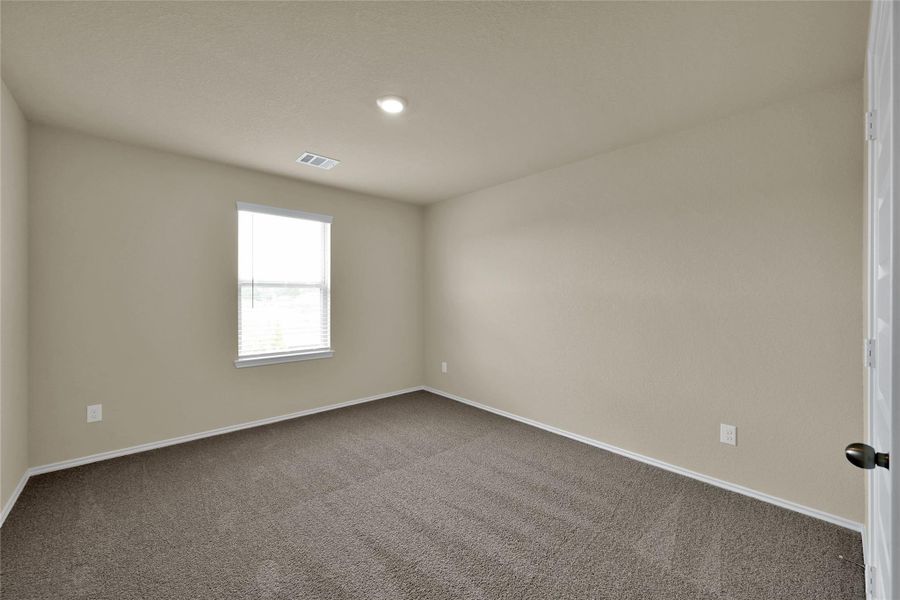 Spacious, unfurnished interior of a new home in Lakes at Black Oak, Magnolia (Image 26).
