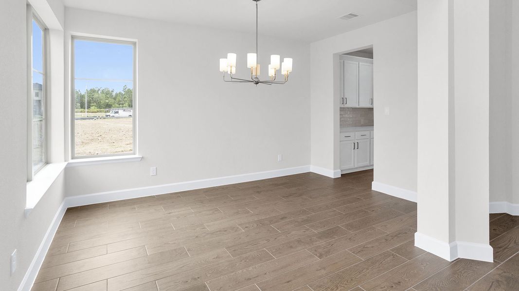 Spacious, unfurnished interior of a new home in Legacy Prairie at Katy Court, Katy (Image 22).