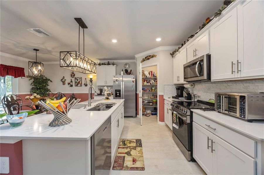 Furnished interior view inside a new home in Burnt Store Village, Punta Gorda (Image 19).