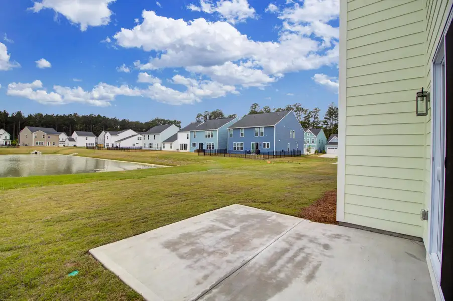 Exterior details and patio area of a home in Homecoming, Ravenel (Image 3).