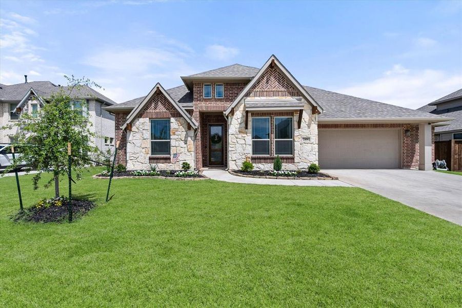 Front exterior of a new home in Somerset, Mansfield, TX, highlighting curb appeal (Image 21). Front exterior of a new home in Somerset, Mansfield, TX, highlighting curb appeal (Image 21).