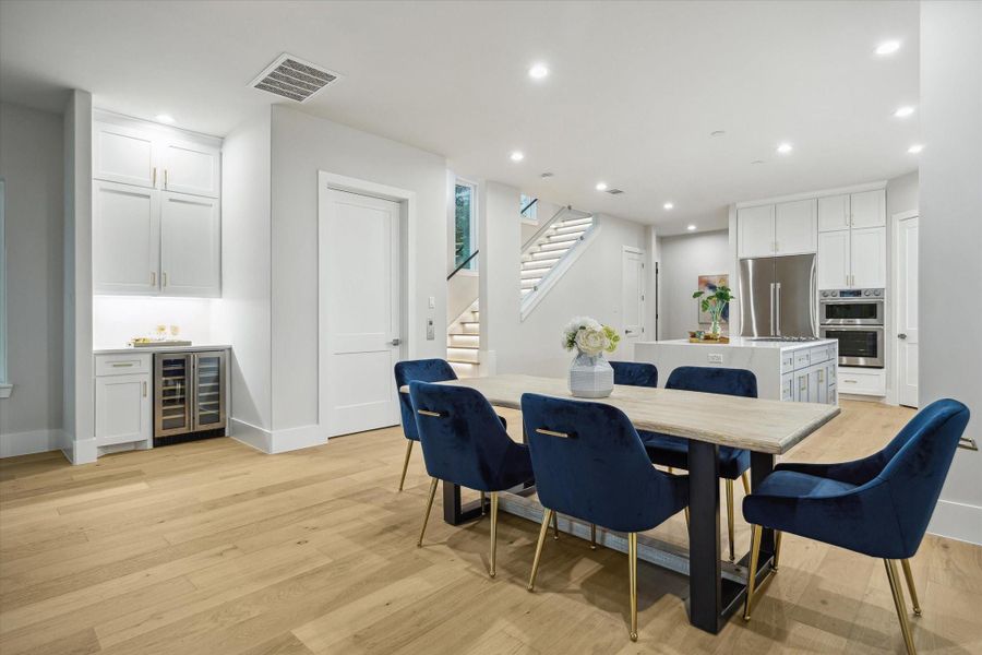 Dining area - has dry bar with wine/beverage cooler and built-in cabinets. Dining area - has dry bar with wine/beverage cooler and built-in cabinets.