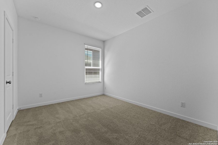 Spacious, unfurnished interior of a new home in Waterwheel: Coastline Collection, San Antonio (Image 23).