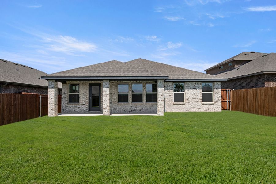 Front exterior of a new home in Northspur, Terrell, TX, highlighting curb appeal (Image 27).