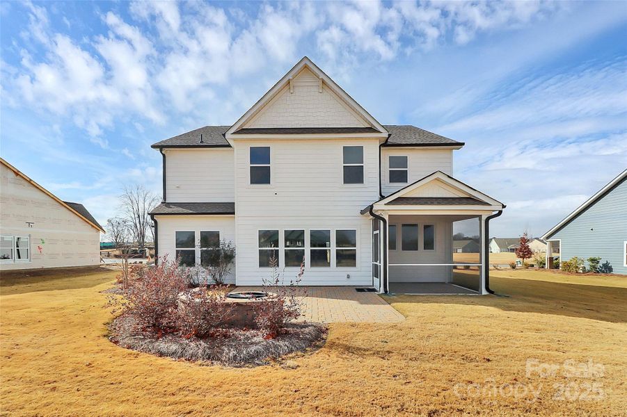 Exterior details and patio area of a home in Stonebridge Fairways, Monroe (Image 25).