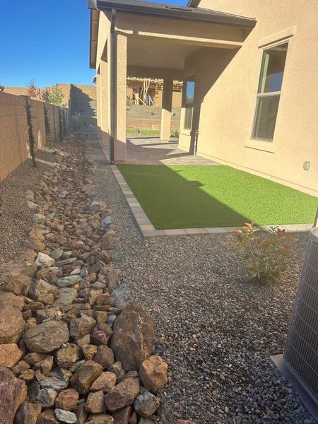 Exterior details and patio area of a home in Horizon at The Dells, Prescott (Image 3). Exterior details and patio area of a home in Horizon at The Dells, Prescott (Image 3).