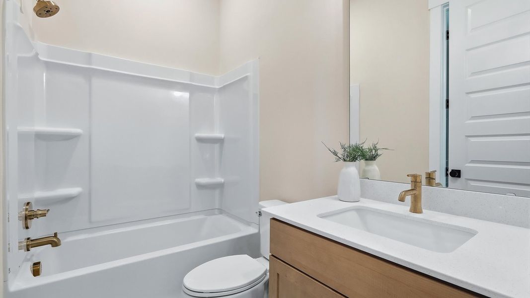Representative furnished interior of a home built from the Stonehaven  II by DRB Homes in Oak Bend, Charleston (Image 17).