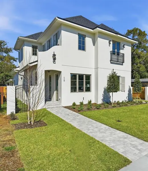 Front exterior of a new home in , Orlando, FL, highlighting curb appeal (Image 1). Front exterior of a new home in , Orlando, FL, highlighting curb appeal (Image 1).