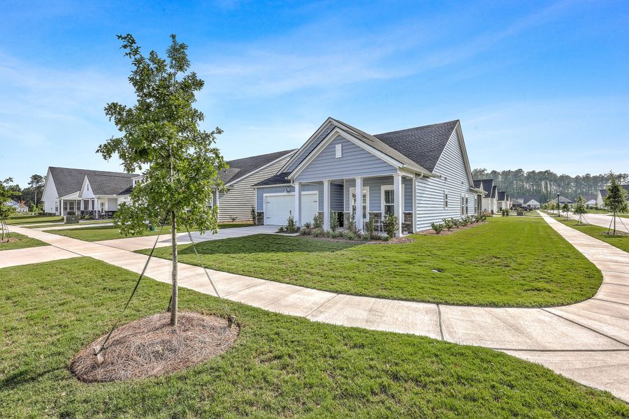 Front exterior of a new home in , Summerville, SC, highlighting curb appeal (Image 20).