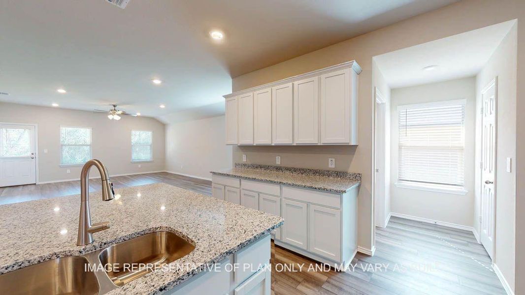 Furnished interior view inside a new home in Reserve at Mallard Lakes, Orange (Image 10).