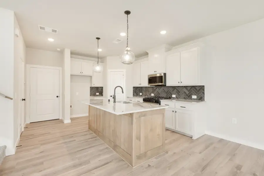 Furnished interior view inside a new home in Ten Mile Creek, Celina (Image 10).