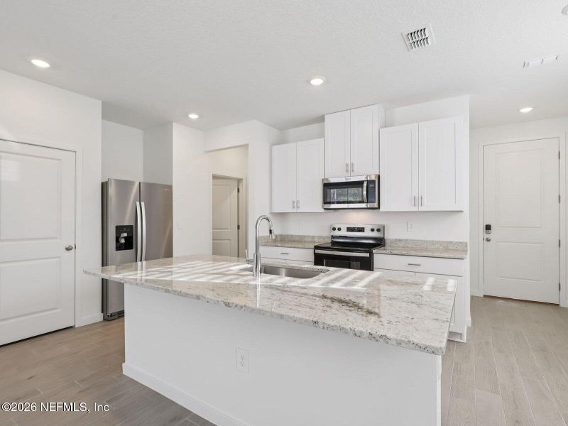 Furnished interior view inside a new home in , Jacksonville (Image 4).