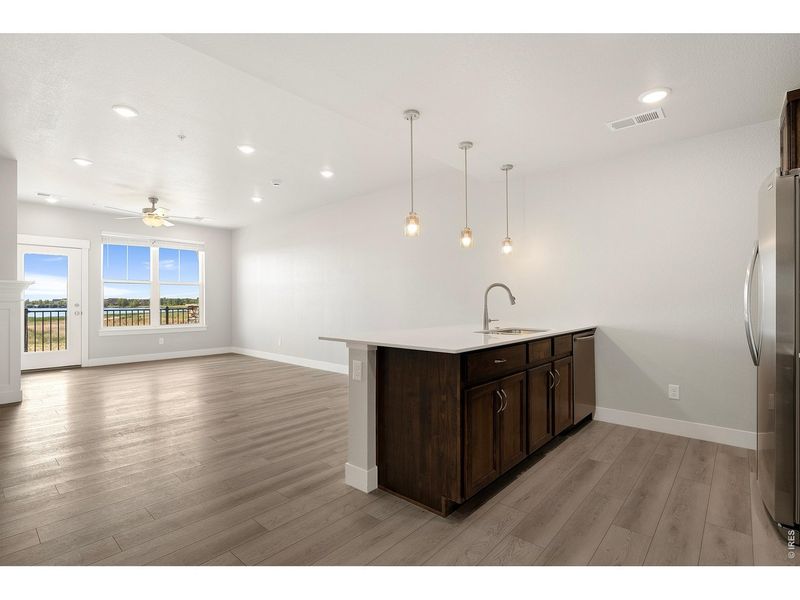 Spacious, unfurnished interior of a new home in The Lakes at Centerra, Loveland (Image 32).