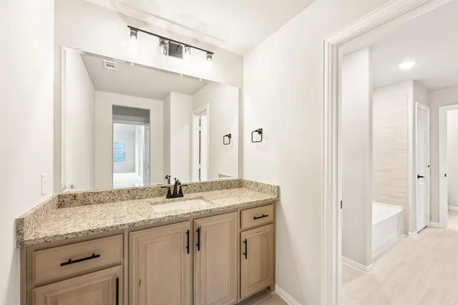 Furnished interior view inside a new home in Willow Wood, McKinney (Image 10).