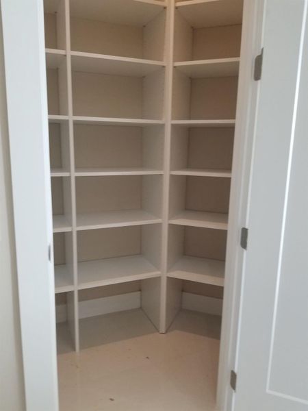 Walk in Pantry- photo from previously built Cypress Model home