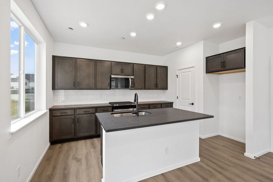 Furnished interior view inside a new home in Harvest Crossing, Aurora (Image 12).