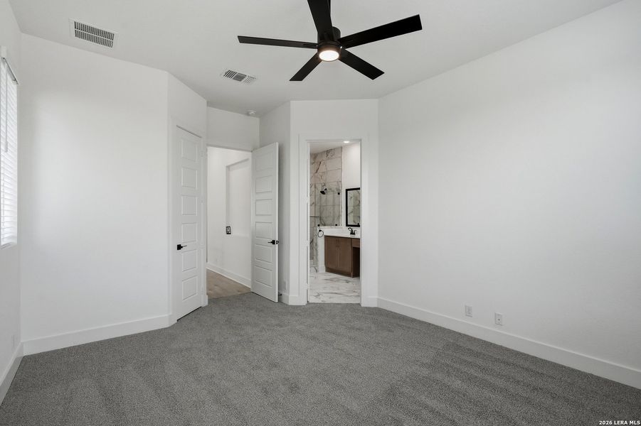 Spacious, unfurnished interior of a new home in Centero at Stone Oak, San Antonio (Image 29).