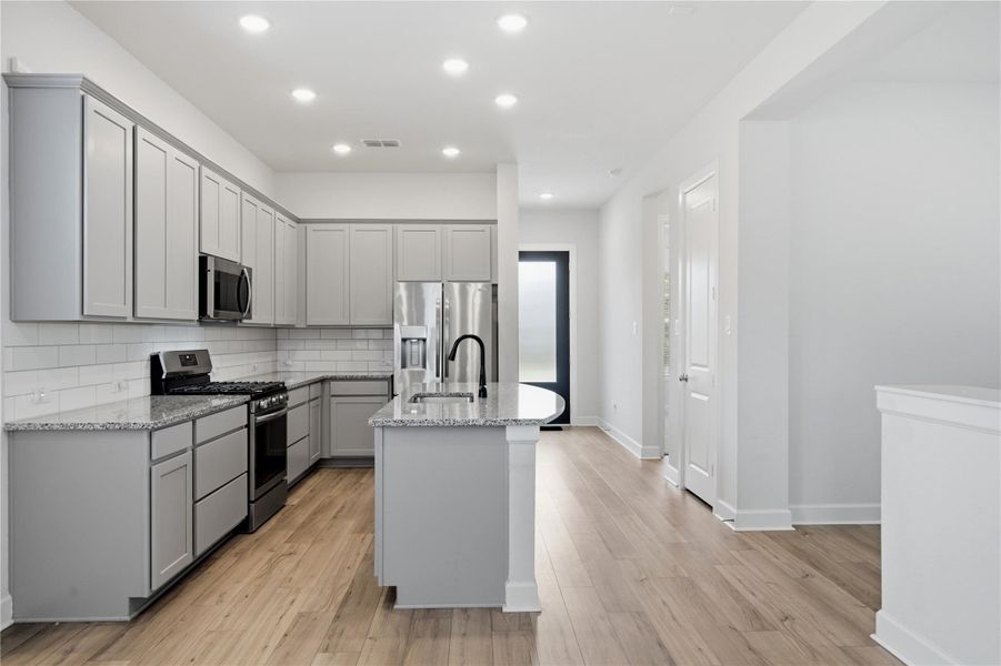 Furnished interior view inside a new home in The Groves 35', Humble (Image 11).