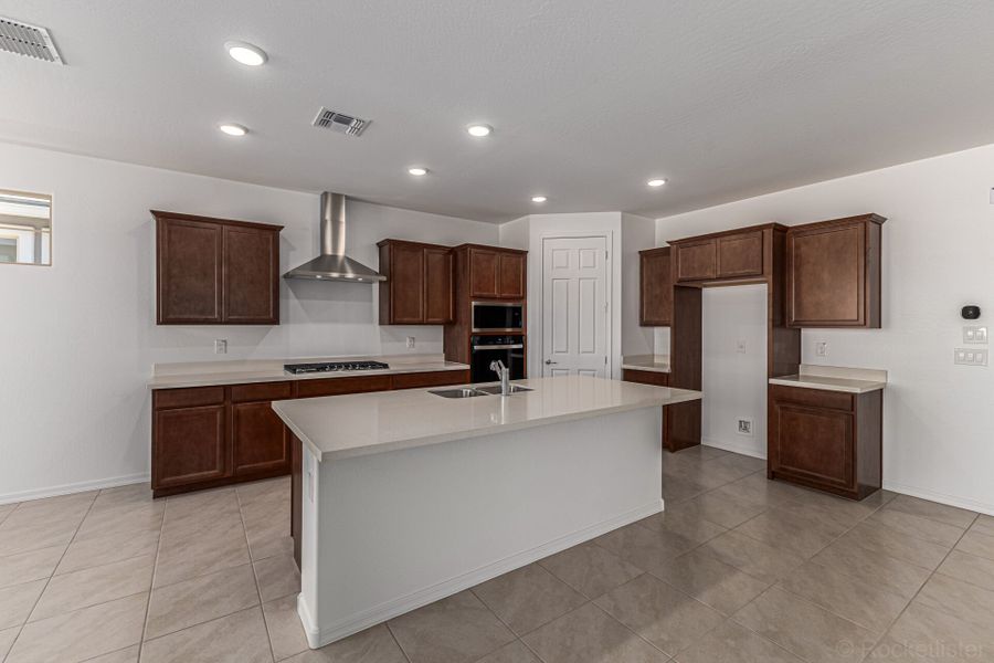 Furnished interior view inside a new home in Empire Pointe, Queen Creek (Image 2).