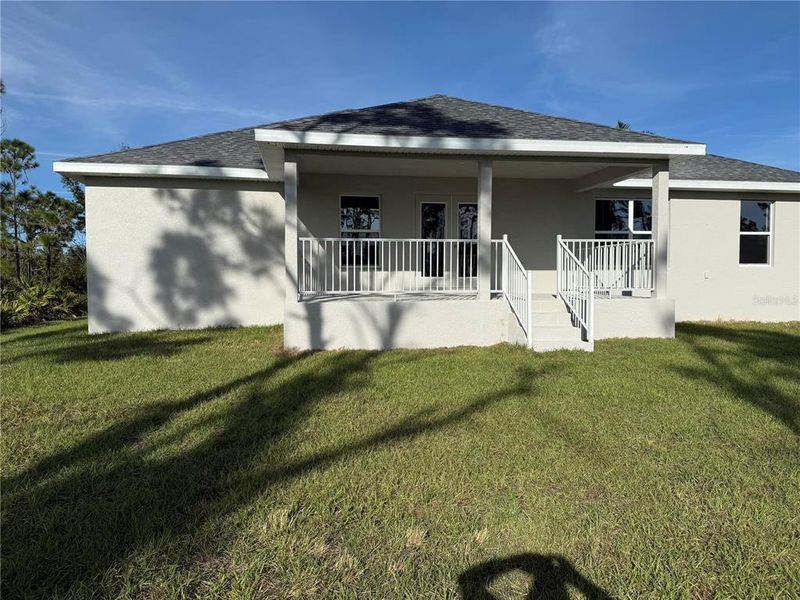 Exterior details and patio area of a home in , Port Charlotte (Image 2).