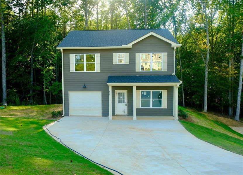 Front exterior of a new home in , Gainesville, GA, highlighting curb appeal (Image 1). Front exterior of a new home in , Gainesville, GA, highlighting curb appeal (Image 1).