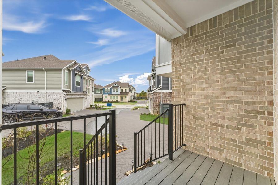 Relax on the elevated porch and take in peaceful neighborhood views.