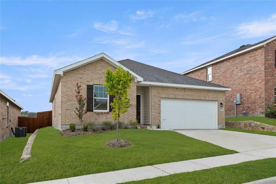 Front exterior of a new home in Noble Ridge, Howe, TX, highlighting curb appeal (Image 1).