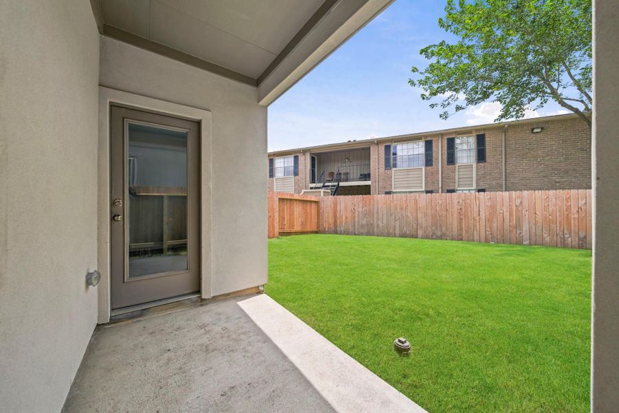 Exterior details and patio area of a home in Park Hill Villas, Stafford (Image 3).