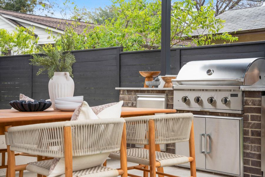 View of patio featuring area for grilling