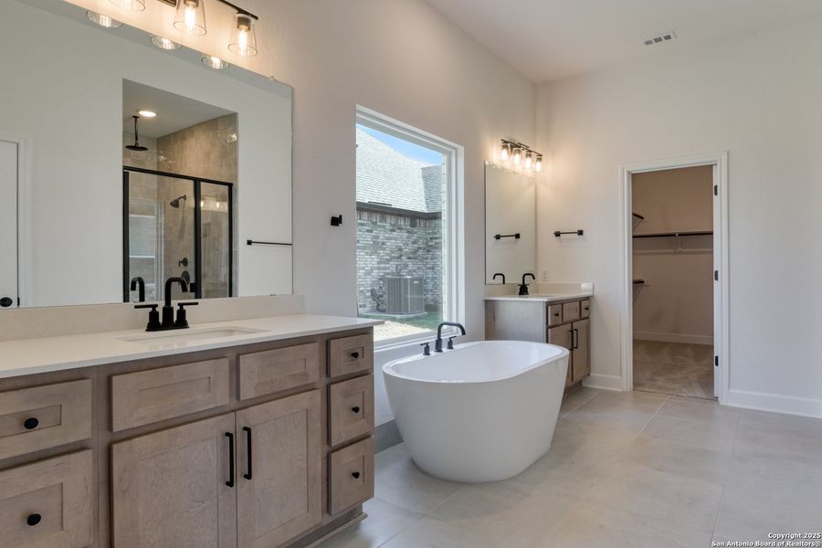 Furnished interior view inside a new home in Megan's Landing 70's, Castroville (Image 6).