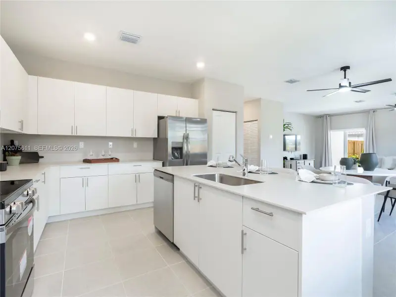 Furnished interior view inside a new home in Wildwood Groves, Miami (Image 10).