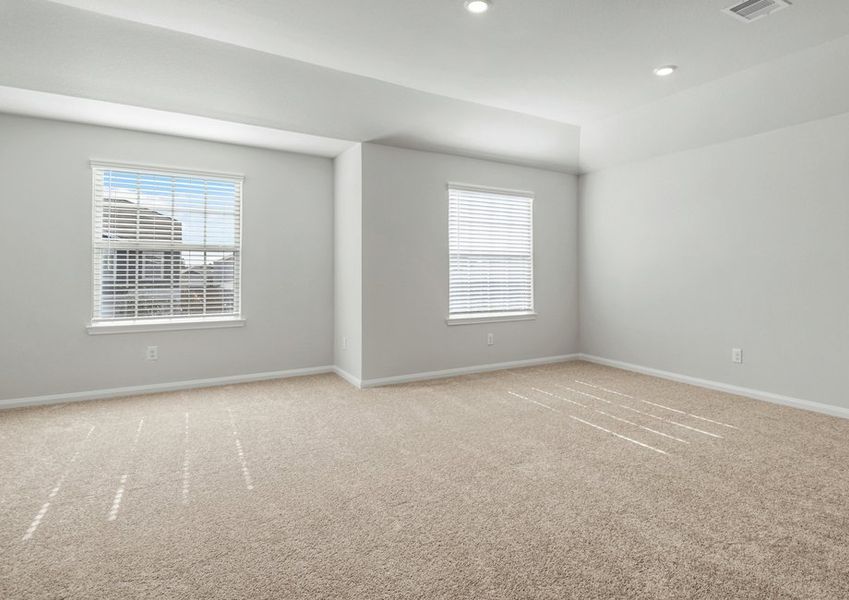 Upstairs master bedroom with two large windows