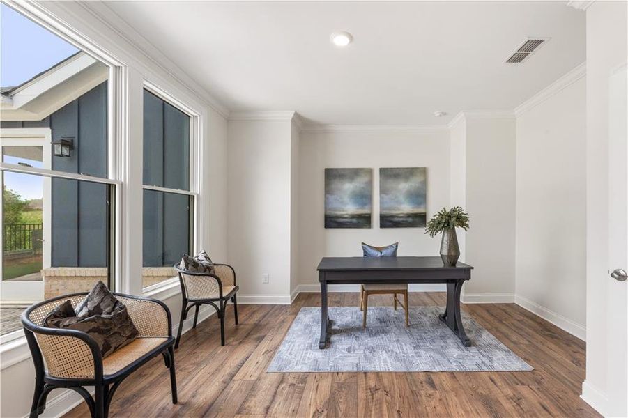 Furnished interior view inside a new home in The Courtyards of Franklin Goldmine, Cumming (Image 14).