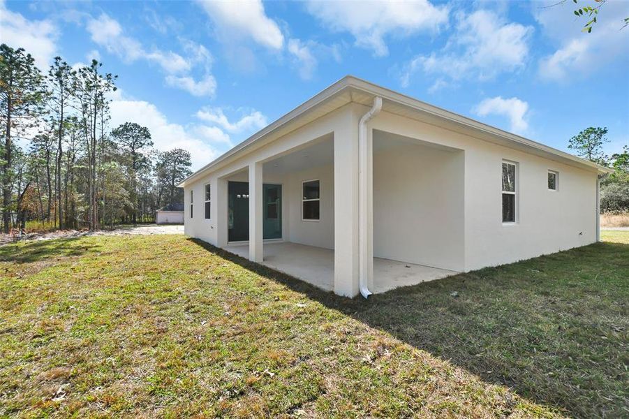 Exterior details and patio area of a home in , Citrus Springs (Image 23).