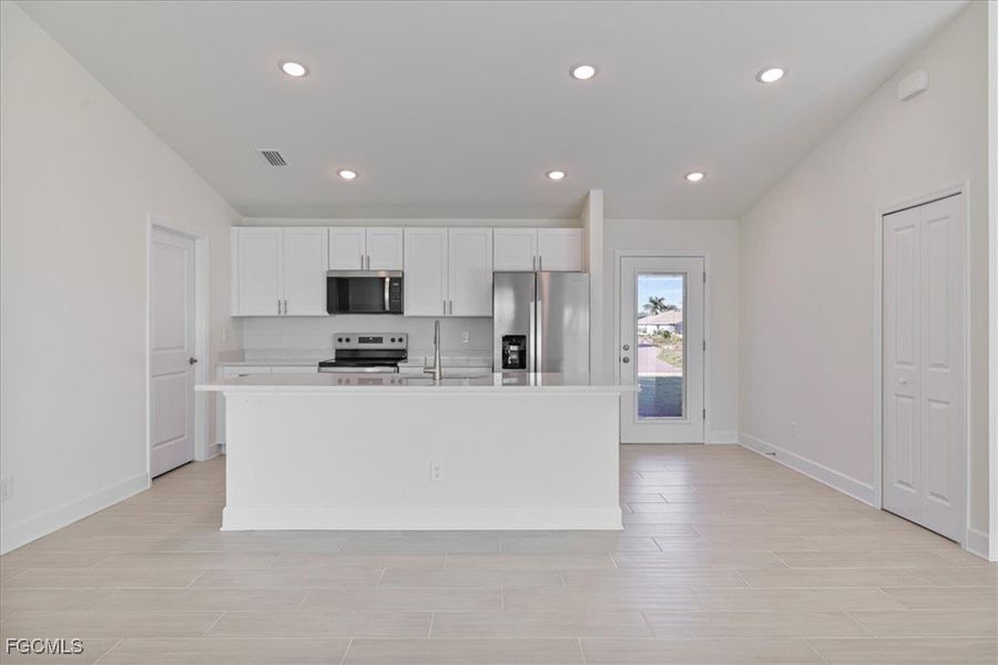 Furnished interior view inside a new home in Cape Coral, Cape Coral (Image 7). Furnished interior view inside a new home in Cape Coral, Cape Coral (Image 7).